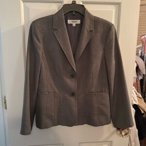 - - Grey blazer. Short style.
Pleated pockets. Good with jeans or business